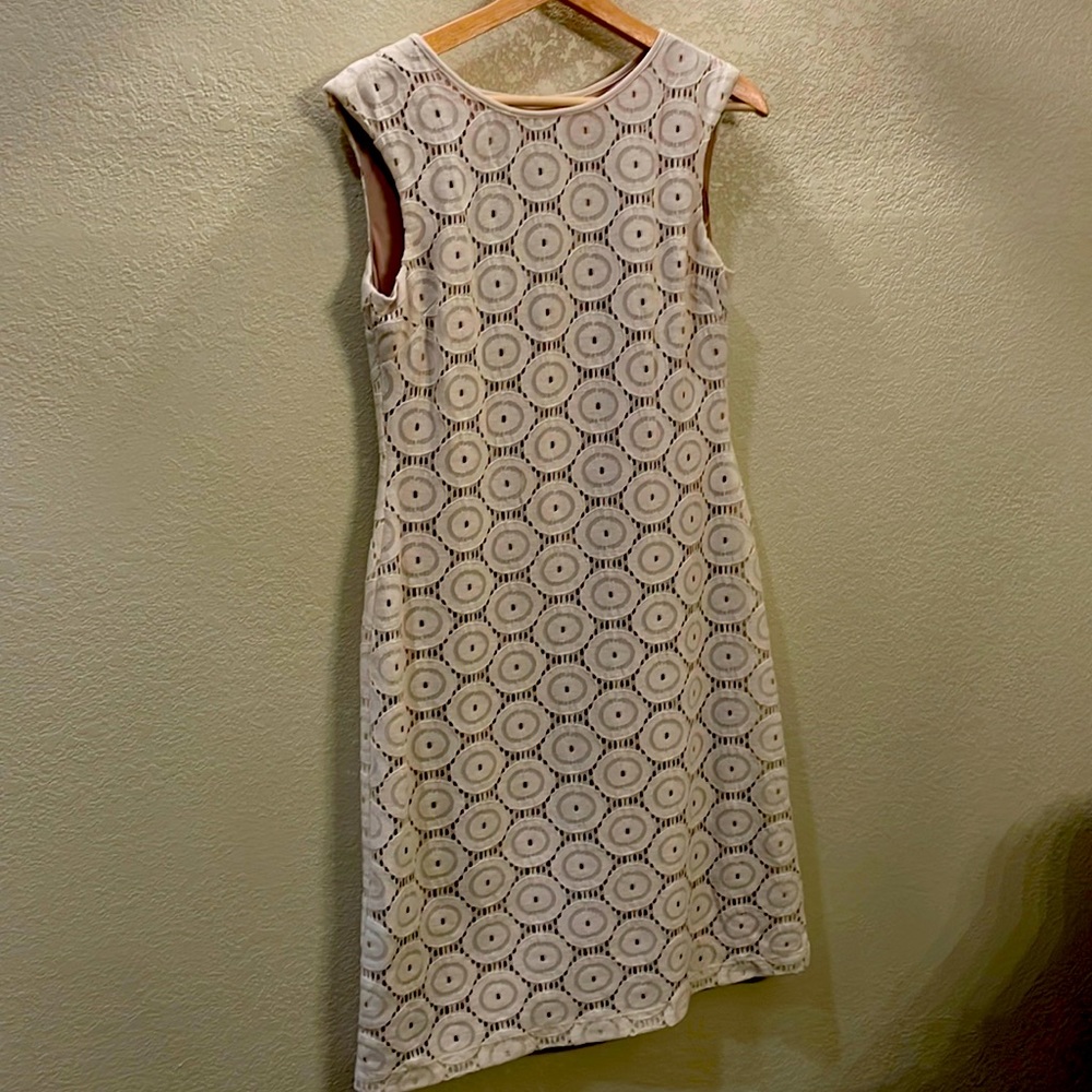 Cream colored sheath dress. Sleeveless. Fully lined. Womens size 4.